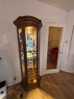 Antieke vitrinekast, Ophalen