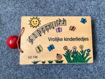 Kinderliedjes op een houten plankje