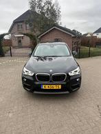 BMW X1 xDrive20i Executive, Auto's, BMW, Stof, Gebruikt, Euro 6, 2000 kg