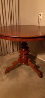 Antieke ronde eettafel, Ophalen