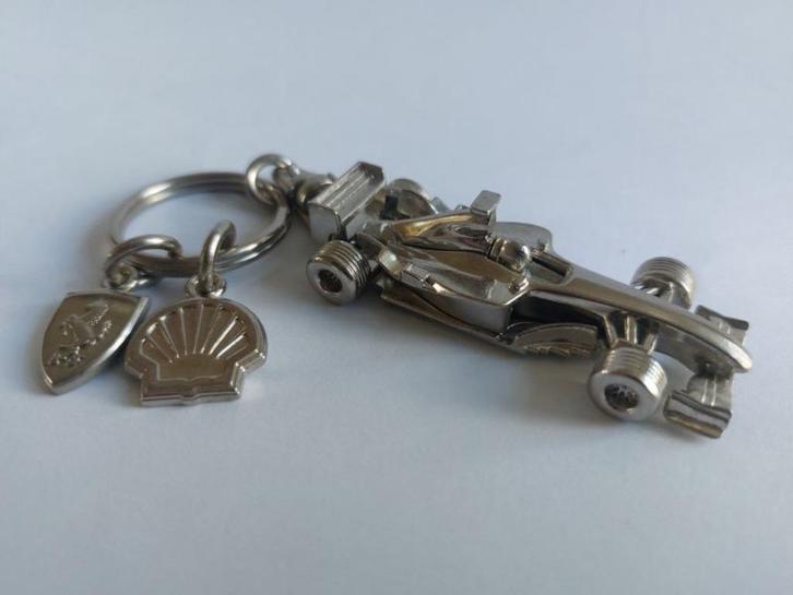 Ferrari F 2004 Sleutelhanger Ferrari licentie Made in China, Hobby en Vrije tijd, Modelauto's | Overige schalen, Nieuw, Overige typen