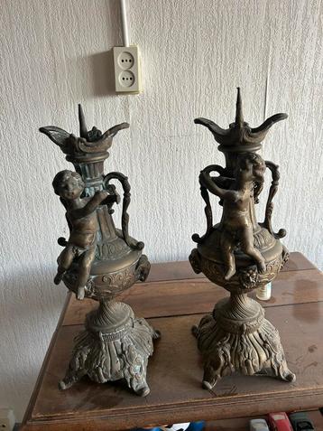 Set antieke kandelaars ongeveer 50 cm hoog. beschikbaar voor biedingen