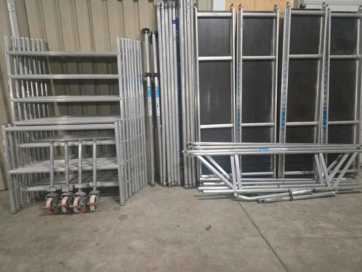 Aluminium rolsteiger euroscaffold 10.20, Doe-het-zelf en Verbouw, Steigers, Zo goed als nieuw, Rolsteiger of Kamersteiger, 5 meter of hoger