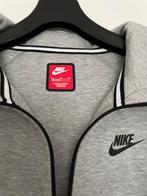 Mooi echt nieuw Nike pak maat 158/170, Ophalen of Verzenden, Zo goed als nieuw, Maat 46 (S) of kleiner, Grijs
