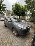 Hyundai iX35 1.6i GDI Blue 135pk 2012 Grijs, Voorwielaandrijving, 1280 kg, 4 cilinders, Leder en Stof