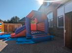 Springkussen te huur 5 bij 5,5 meter met Glijbaan, Hobby en Vrije tijd, Ophalen, Zo goed als nieuw, Overige