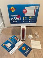AVM FritzBox 6690 Cable – 1 jaar oud, perfect werkend, Computers en Software, Routers en Modems, Ophalen of Verzenden, Zo goed als nieuw