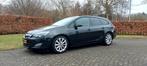 Opel Astra 1.4 Turbo 88KW Sports Tourer 2012 Zwart, Auto's, Opel, Voorwielaandrijving, 4 cilinders, Leder en Stof, Zwart