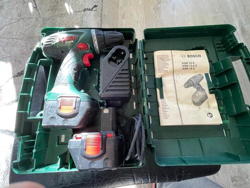 Bosch psr12-2 accuboormachine 2 accus en oplader in koffer, Doe-het-zelf en Verbouw, Gereedschap | Boormachines, Gebruikt, Boormachine