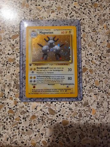 First edition magneton holo 9/102 NM  beschikbaar voor biedingen