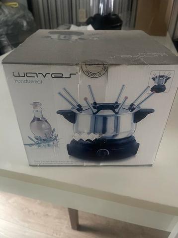 Nieuwe Waves Elektrische Fondueset beschikbaar voor biedingen
