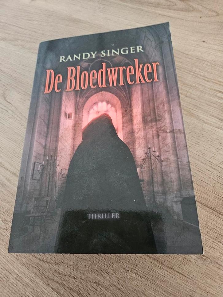 De Bloedwreker - Randy Singer Thriller, Boeken, Thrillers, Gelezen, Nederland, Ophalen of Verzenden