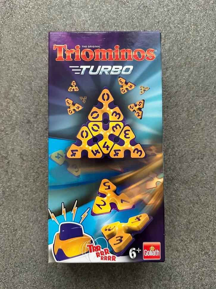 Triominos turbo compleet en in NIEUWSTAAT., Hobby en Vrije tijd, Gezelschapsspellen | Overige, Zo goed als nieuw, Een of twee spelers