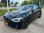 BMW 1-Serie 116i groot display, chiptuned 2012 Zwart, Auto's, BMW, 1-Serie, 65 €/maand, USB, Beige