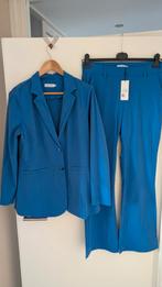 Nieuwe pak set van Nicolette Kluijver travelstof. Maat XL, Kostuum of Pak, Blauw, Maat 46/48 (XL) of groter, Nieuw