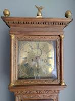 Antiek staand horloge, Ophalen