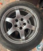 Rial aluminium velg met een winterband., Ophalen