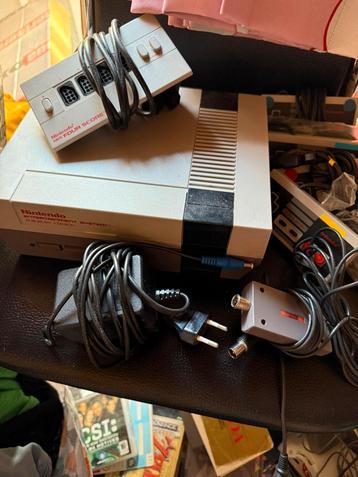Nes console en games beschikbaar voor biedingen