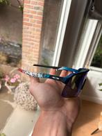 Custom oakley sutro rood wit blauw !, Sieraden, Tassen en Uiterlijk, Zonnebrillen en Brillen | Heren, Ophalen of Verzenden, Zo goed als nieuw