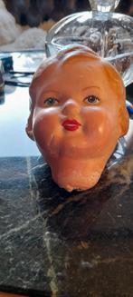 Antiek poppen hoofd, Ophalen