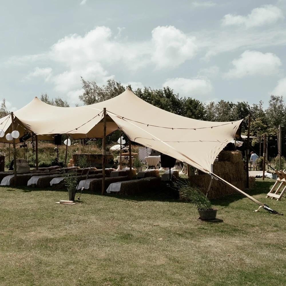 Stretchtent 10x15 meter te koop. Origineel Zuid Afrikaans!, Tuin en Terras, Partytenten, Ophalen, Gebruikt, Overige typen, 6 meter of meer