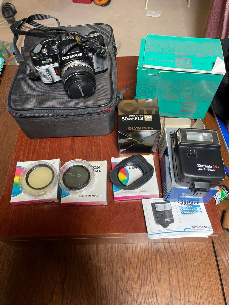 Olympus OM40 Program Spiegelreflexcamera met accessoires, Gebruikt, Spiegelreflex, Ophalen of Verzenden, Olympus