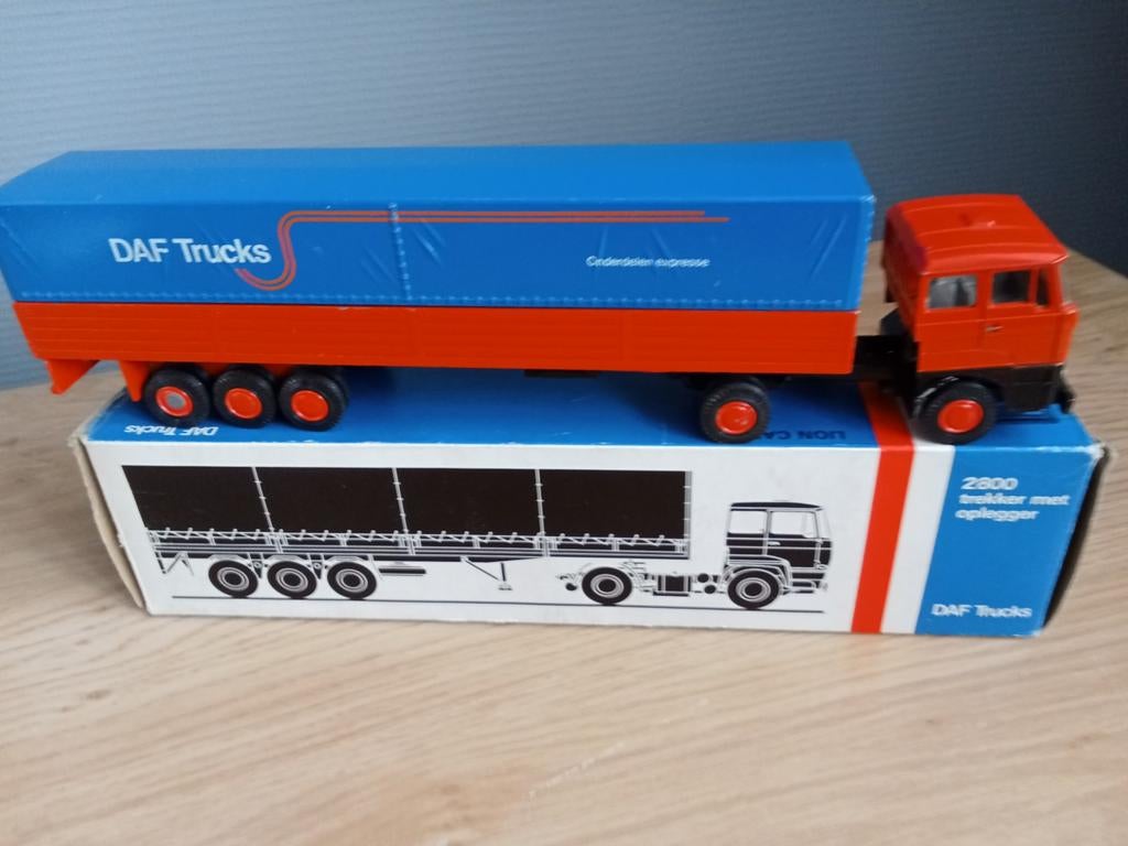 Daf in doos, Hobby en Vrije tijd, Modelauto's | 1:50, Ophalen of Verzenden, Bus of Vrachtwagen, Lion Toys