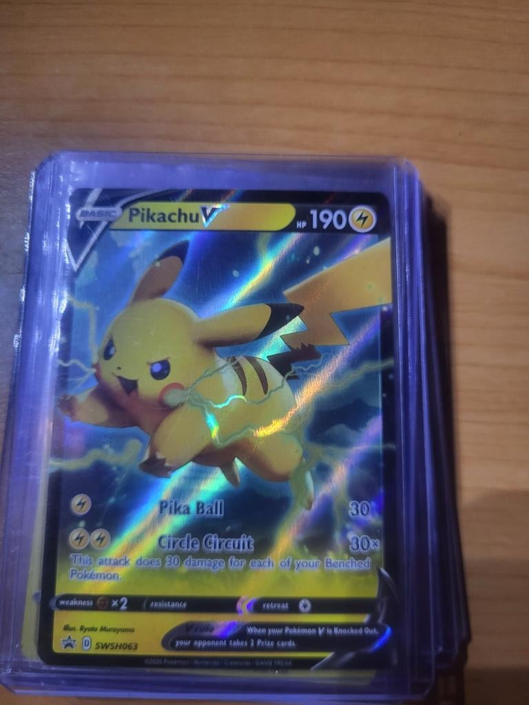 Pikachu SWSH063, Ophalen of Verzenden, Zo goed als nieuw, Losse kaart, Foil