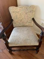 Antieke fauteuil met bloemenpatroon, Ophalen