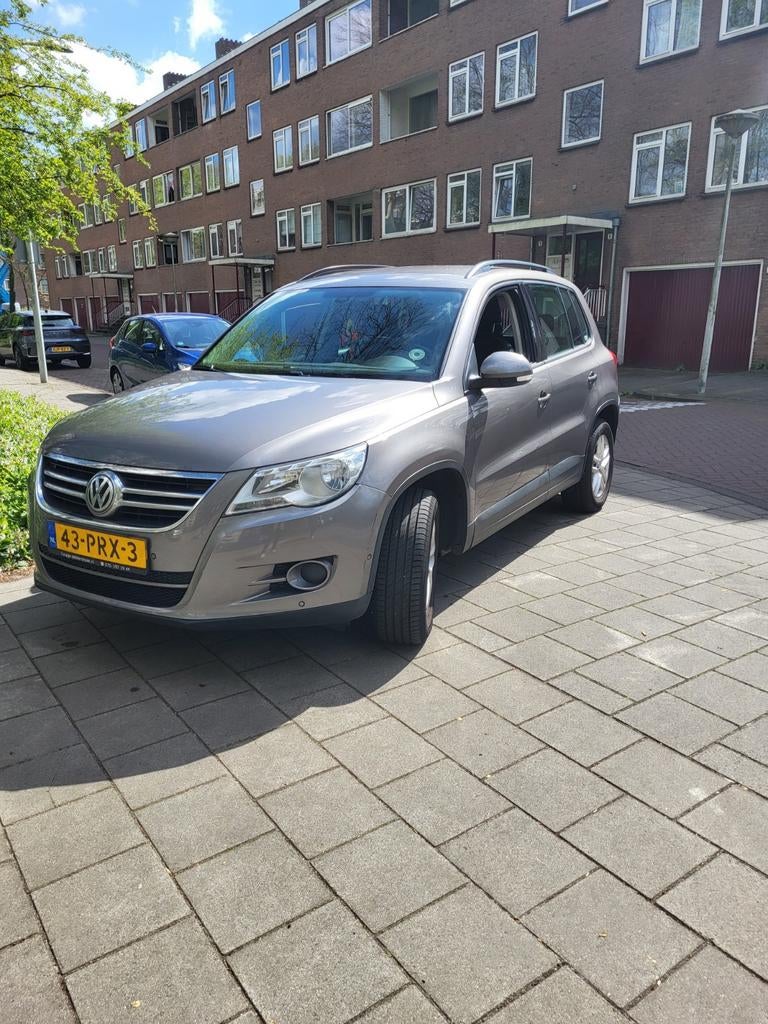 Volkswagen Tiguan 1.4 TSI 110KW 2011 Grijs, Voorwielaandrijving, 15 km/l, 1800 kg, Navigatiesysteem