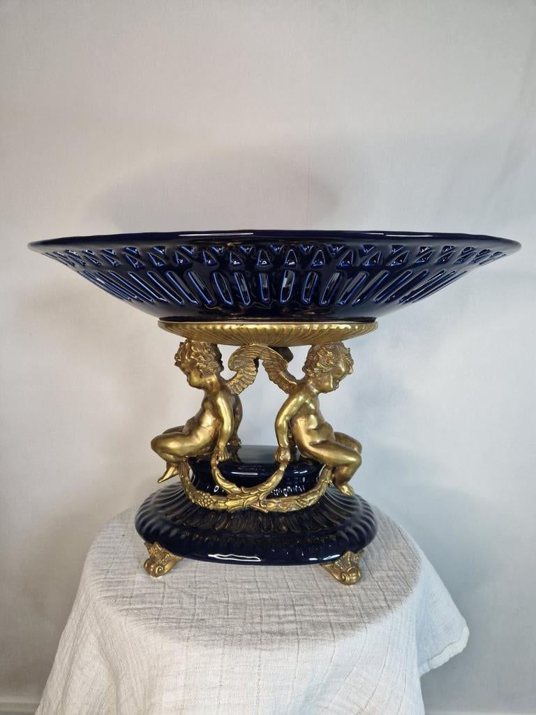 Fruitschaal - fruitschaal - Porselein, Brons,
gepatineerd -, Ophalen