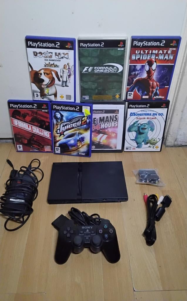 PlayStation 2 set met games, nette conditie, Spelcomputers en Games, Spelcomputers | Sony PlayStation 2, Met games, Zwart, Ophalen of Verzenden