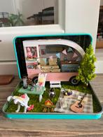 Blikje met miniatuur camping, Ophalen