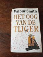 Wilbur Smith - Het oog van de tijger, Boeken, Ophalen of Verzenden, Gelezen, Wilbur Smith, Nederland