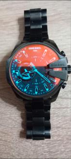 Hallo ik bied me diesel horloge aan winkel prijs is 300 350, Ophalen of Verzenden, Zo goed als nieuw, Zwart, Jongen