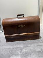 Antieke Singer naaimachine, Ophalen