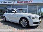 BMW 1-serie 114i Business+ Sport Line/leder/airco/bi xenon/n, 1-Serie, Achterwielaandrijving, Gebruikt, Zwart