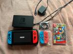 Nintendo Switch (Rood/Blauw) + Super Mario Odyssey, Spelcomputers en Games, Ophalen, Met games, Met 2 controllers, Zo goed als nieuw