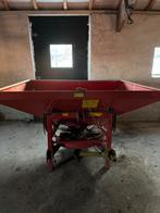 Kunstmest strooier, Ophalen