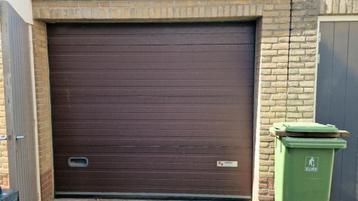 Nassau garagedeur (sectionaal) beschikbaar voor biedingen