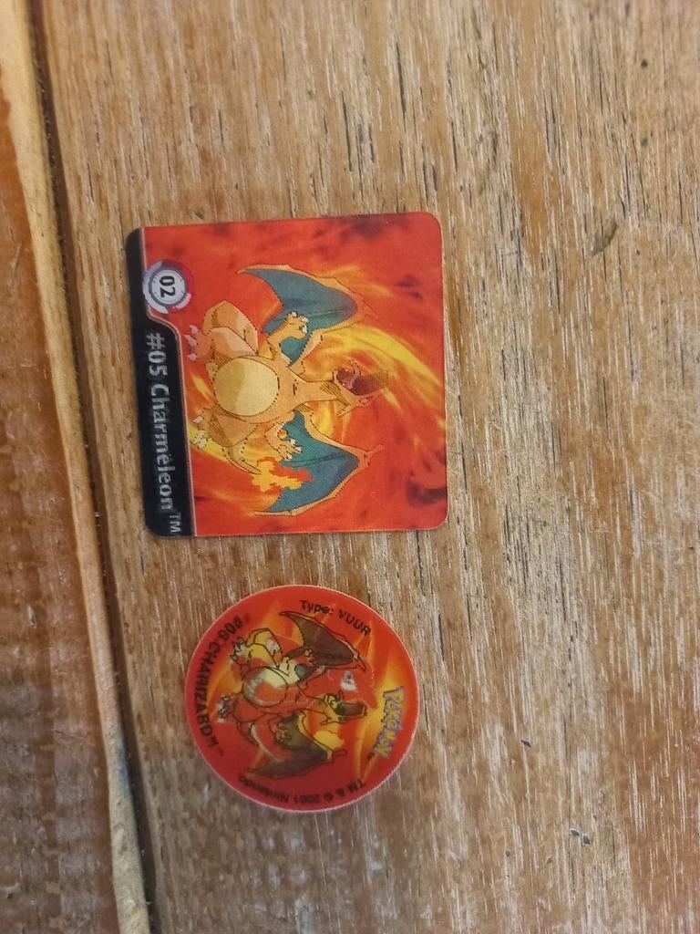 Charizard  flippo  en artbox 3d, Ophalen of Verzenden, Zo goed als nieuw, Meerdere kaarten, Foil