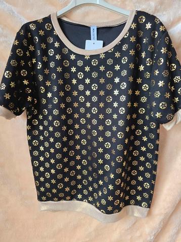 Zwarte top met gouden print beschikbaar voor biedingen