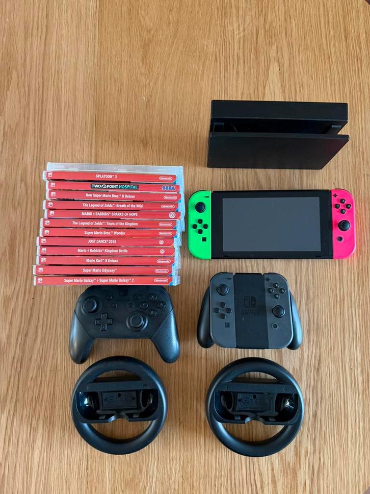 Nintendo Switch + 13 top games en extra controllers, Spelcomputers en Games, Spelcomputers | Nintendo Switch, Gebruikt, Switch Original