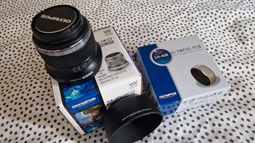 Olympus M.Zuiko Digital 45mm f 1.8 Zwart met zonnekap beschikbaar voor biedingen