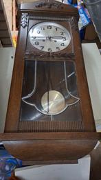 Antieke wandklok, Ophalen