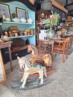 Antiek houten paard, Ophalen