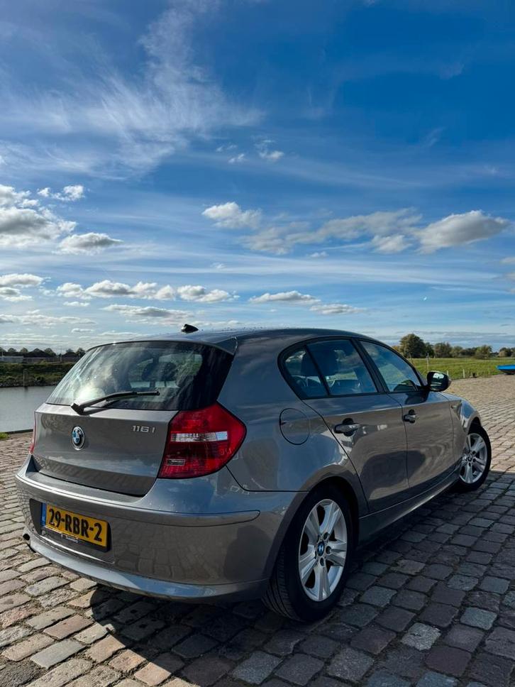 BMW 1-Serie 2.0 116I 5DR 2011 Grijs, Auto's, BMW, Particulier, ABS, Adaptive Cruise Control, Airbags, Airconditioning, Alarm, Bluetooth