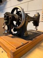 Handnaaimachine, Ophalen