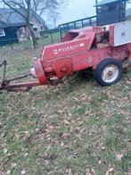 balenpers en palkasploeg, Ophalen, Oogstmachine