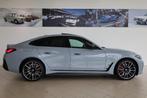 BMW i4 M50 High Executive | M Sportpakket Pro | Glazen schui, Auto's, Stof, 520 km, Met garantie (alle), 2190 kg